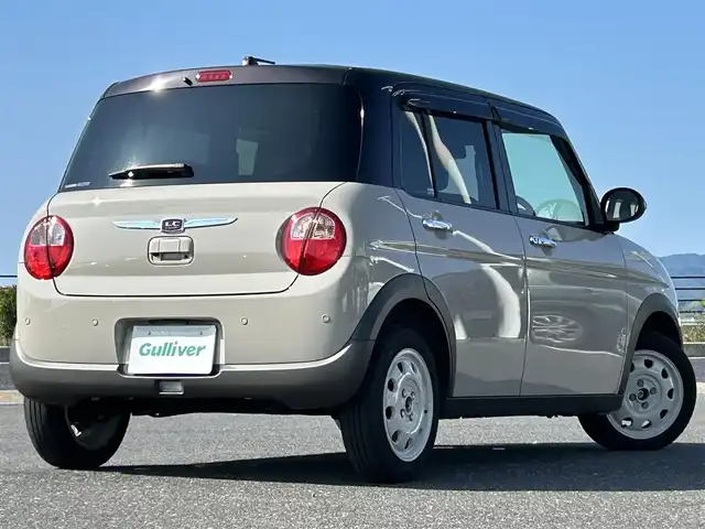 スズキ ラパン ＬＣ X 島根県 2023(令5)年 1.4万km フォーンベージュメタリック/アーバンブラウン 2トーン ワンオーナー/純正ディスプレイオーディオ/(AM/FM/USB/Bluetooth)/バックカメラ/ビルトインETC/リアパーキングセンサー/車線逸脱警報/デュアルカメラカメラブレーキサポート/横滑り防止装置/革巻きステアリング/ステアリングスイッチ/プッシュスタート/スマートキー/純正フロアマット/ドアバイザー/純正14インチアルミホイール/取扱説明書/保証書