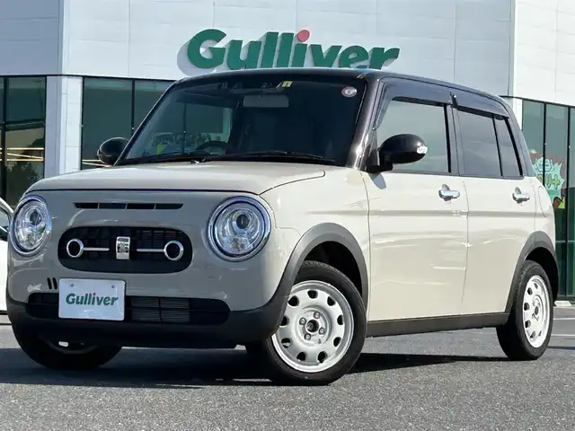 スズキ ラパン ＬＣ X 島根県 2023(令5)年 1.4万km フォーンベージュメタリック/アーバンブラウン 2トーン ワンオーナー/純正ディスプレイオーディオ/(AM/FM/USB/Bluetooth)/バックカメラ/ビルトインETC/リアパーキングセンサー/車線逸脱警報/デュアルカメラカメラブレーキサポート/横滑り防止装置/革巻きステアリング/ステアリングスイッチ/プッシュスタート/スマートキー/純正フロアマット/ドアバイザー/純正14インチアルミホイール/取扱説明書/保証書