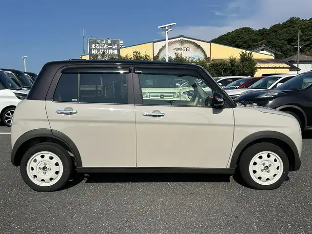 スズキ ラパン ＬＣ X 島根県 2023(令5)年 1.4万km フォーンベージュメタリック/アーバンブラウン 2トーン ワンオーナー/純正ディスプレイオーディオ/(AM/FM/USB/Bluetooth)/バックカメラ/ビルトインETC/リアパーキングセンサー/車線逸脱警報/デュアルカメラカメラブレーキサポート/横滑り防止装置/革巻きステアリング/ステアリングスイッチ/プッシュスタート/スマートキー/純正フロアマット/ドアバイザー/純正14インチアルミホイール/取扱説明書/保証書