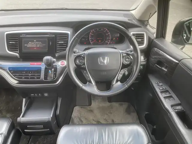 ホンダ オデッセイ アブソルート EX 埼玉県 2013(平25)年 10.3万km プレミアムヴィーナスブラックP (株)IDOMが運営する【じしゃロン鳩ヶ谷店】の自社ローン専用車両になりますこちらは現金またはオートローンご利用時の価格です。自社ローンご希望の方は別途その旨お申付け下さい/純正ナビ（Hondaインターナビ）/フルセグテレビ/全周囲カメラ/両側パワースライドドア/あんしんパッケージ/　シティブレーキ/　ダブル/サイド/カーテンエアバッグ/衝突軽減システム/レーダークルーズコントロール/ETC/純正18インチAW/純正フロアマット/運転席パワーシート/前席シートヒーター/本革シート/パドルシフト/純正LEDヘッドライト/２列目プレミアムクレイドルシート/横滑り防止装置/プッシュスタート/アイドリングストップ