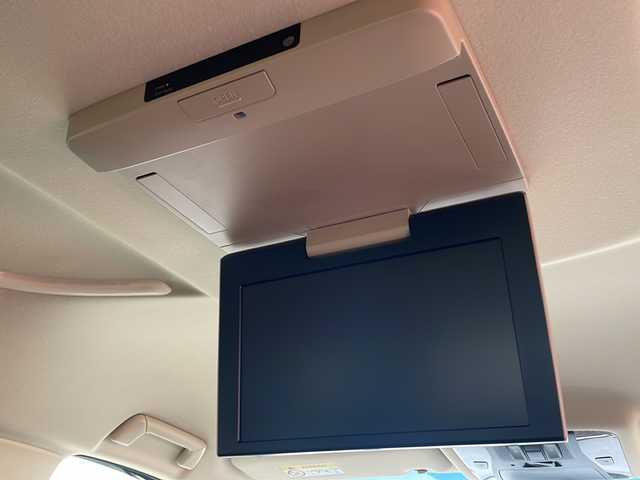 トヨタ ヴェルファイア X 岩手県 2015(平27)年 5.2万km ホワイトパールクリスタルシャイン 純正9インチナビ/CD/DVD/Bluetooth/フルセグTV/純正フリップダウンモニター/バックカメラ/ビルトインETC/両側パワースライドドア/コーナーセンサー/革調シートカバー/アイドリングストップ/オートライト/LEDヘッドライト/スマートキー/プッシュスタート/電動格納ミラー/純正16インチAW/フロアマット/ドアバイザー