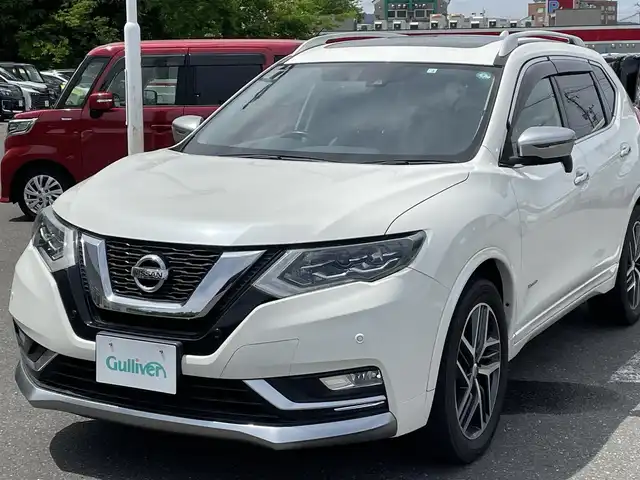 日産 エクストレイル ハイブリッド モード・プレミア 青森県 2018(平30)年 5.7万km ブリリアントホワイトパール パートタイム4WD/純正９インチナビ/(CD/Blu-ray/BT/USB/iPod/HDMI)/バックカメラ/ETC/サンルーフ/プロパイロット/コーナーセンサー/前後ドライブレコーダー/レザーシート/全席シートヒーター/オートライト/LEDヘッドライト/フォグランプ/前後コーナーセンサー/電動リアゲート/電動パーキングブレーキ/オートホールド/ルーフレール/ダウンヒルアシスト/ステアリングリモコン/革巻きステアリング/スマートキー/電動格納ミラー/純正ドアバイザー/純正フロアマット/純正アルミ１９インチ