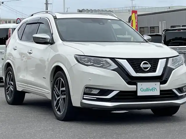 日産 エクストレイル ハイブリッド モード・プレミア 青森県 2018(平30)年 5.7万km ブリリアントホワイトパール パートタイム4WD/純正９インチナビ/(CD/Blu-ray/BT/USB/iPod/HDMI)/バックカメラ/ETC/サンルーフ/プロパイロット/コーナーセンサー/前後ドライブレコーダー/レザーシート/全席シートヒーター/オートライト/LEDヘッドライト/フォグランプ/前後コーナーセンサー/電動リアゲート/電動パーキングブレーキ/オートホールド/ルーフレール/ダウンヒルアシスト/ステアリングリモコン/革巻きステアリング/スマートキー/電動格納ミラー/純正ドアバイザー/純正フロアマット/純正アルミ１９インチ