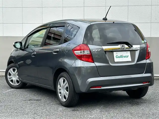 ホンダ フィット XH 東京都 2013(平25)年 6.6万km ポリッシュドメタルメタリック 純正9インチメモリナビ/CD/DVD/FM・AM/SD//フルセグTV/バックカメラ/ETC/ドライブレコーダー前後/クルーズコントロール/シートヒーター/キセノンヘッドライト/純正フロアマット/ドアバイザー/トノカバー/スマートキー/保証書/取扱説明書/スペアキー