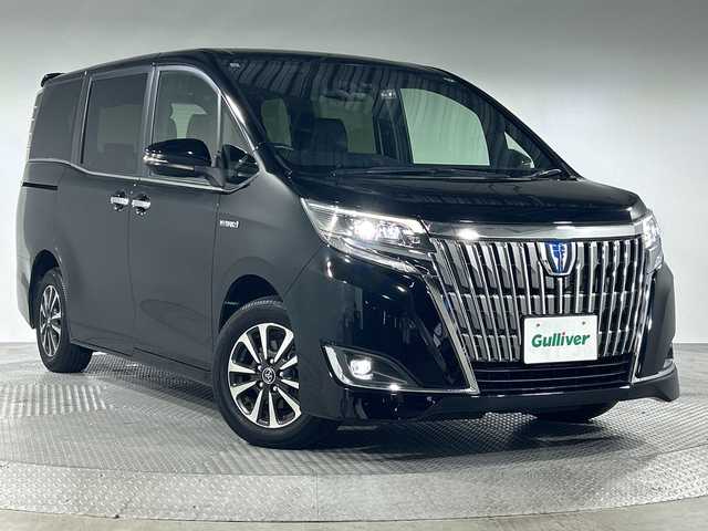 トヨタ エスクァイア ハイブリッド Gi プレミアムパッケージ 神奈川県 2017(平29)年 6.7万km ブラック 純正9型SDナビゲーション【NSZT-Y66T】/AM FM フルセグ Bluetooth CD DVD SD/バックカメラ/両側パワースライドドア/純正12.1型フリップダウンモニター/セーフティセンス/先行車発進告知/レーンディパーチャーアラート/プリクラッシュセーフティ/トラクションコントロール/ビルトインETC/ハーフレザーシート/前席シートヒーター/ステアリングヒーター/ステアリングリモコン/純正フロアマット/スマートキー/スペアキー/LEDヘッドライト/オートライト/オートマチックハイビーム/純正15インチアルミホイル
