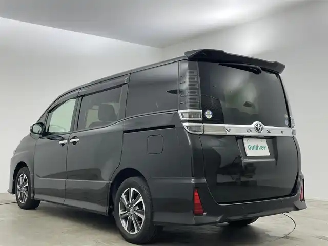 トヨタ ヴォクシー ZS 煌Ⅱ 岡山県 2019(平31)年 4.4万km イナズマスパーキングブラックガラスフレーク 純正9インチナビ/（CD/DVD/BT/フルセグTV）/バックカメラ/両側パワースライドドア/トヨタセーフティセンス/クルーズコントロール/LEDヘッドライト/LEDフォグランプ/オートライト/ビルトインETC/前方ドライブレコーダー/純正16インチアルミ/純正フロアマット/純正ドアバイザー/新車保証書/取扱説明書