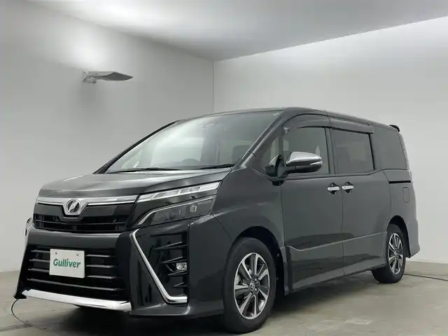 トヨタ ヴォクシー ZS 煌Ⅱ 岡山県 2019(平31)年 4.4万km イナズマスパーキングブラックガラスフレーク 純正9インチナビ/（CD/DVD/BT/フルセグTV）/バックカメラ/両側パワースライドドア/トヨタセーフティセンス/クルーズコントロール/LEDヘッドライト/LEDフォグランプ/オートライト/ビルトインETC/前方ドライブレコーダー/純正16インチアルミ/純正フロアマット/純正ドアバイザー/新車保証書/取扱説明書