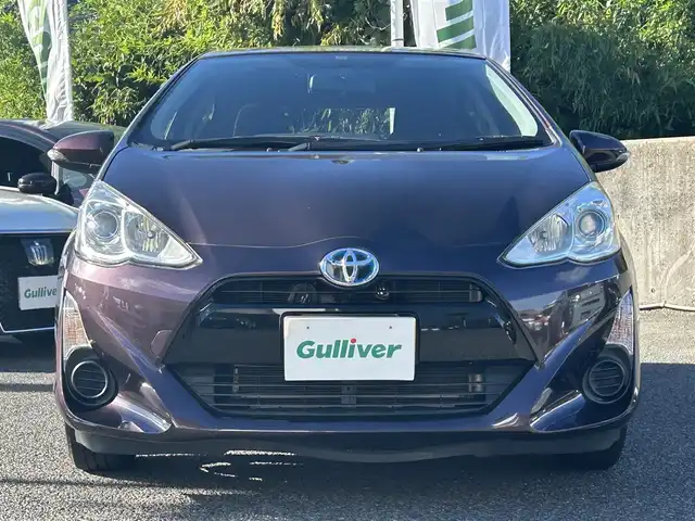 トヨタ アクア G 長崎県 2014(平26)年 8.4万km ディープアメジストマイカメタリック トヨタ純正SDナビ(FM/AM/CD/DVD/BT/TV)/ETC/ドライブモードセレクト/ステアリングリモコン/社外シフトレバー/バックカメラ/純正フロアマット/LMSport15インチアルミホイール/オートライト/手動光軸調整ダイヤル/車両接近通報/クルーズコントロール/ABS/VSC/イモビライザーシステム/スマートキー/SRSダブルエアバッグ/ISOFIX/取扱説明書/記録簿/保証書