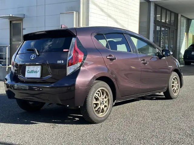 トヨタ アクア G 長崎県 2014(平26)年 8.4万km ディープアメジストマイカメタリック トヨタ純正SDナビ(FM/AM/CD/DVD/BT/TV)/ETC/ドライブモードセレクト/ステアリングリモコン/社外シフトレバー/バックカメラ/純正フロアマット/LMSport15インチアルミホイール/オートライト/手動光軸調整ダイヤル/車両接近通報/クルーズコントロール/ABS/VSC/イモビライザーシステム/スマートキー/SRSダブルエアバッグ/ISOFIX/取扱説明書/記録簿/保証書