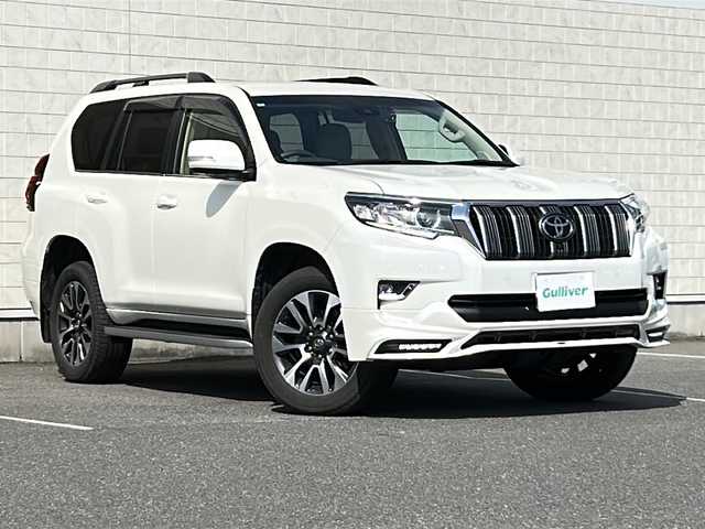 トヨタ ランドクルーザー プラド TZ－G 茨城県 2023(令5)年 3.2万km ホワイトパールクリスタルシャイン ワンオーナー/TRDエアロ/純正ディスプレイオーディオ＆ナビ機能有/(地デジTV・BT・USB・ラジオ再生)/レーダークルーズコントロール/レーンアシスト/プリクラッシュセーフティ/ベージュ革シート/シートベンチレーション/パワーシート/BSM/アラウンドビューモニター/ドライブレコーダー/ETC/オートライト/LEDヘッドライト/純正18inアルミホイール/純正フロアマット/スマートキー/スペアキー/取扱説明書/保証書