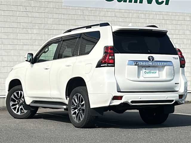 トヨタ ランドクルーザー プラド TZ－G 茨城県 2023(令5)年 3.2万km ホワイトパールクリスタルシャイン ワンオーナー/TRDエアロ/純正ディスプレイオーディオ＆ナビ機能有/(地デジTV・BT・USB・ラジオ再生)/レーダークルーズコントロール/レーンアシスト/プリクラッシュセーフティ/ベージュ革シート/シートベンチレーション/パワーシート/BSM/アラウンドビューモニター/ドライブレコーダー/ETC/オートライト/LEDヘッドライト/純正18inアルミホイール/純正フロアマット/スマートキー/スペアキー/取扱説明書/保証書