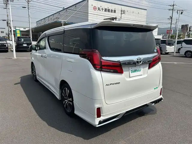 トヨタ アルファード S Cパッケージ 岡山県 2018(平30)年 5.8万km ホワイトパールクリスタルシャイン 登録時走行距離58026km/ワンオーナー/モデリスタエアロ/純正10インチナビ/フルセグTV(AM.FM.CD.DVD.TV.BT)/フリップダウンモニター/両側パワースライドドア/前後バックカメラ/ETC2.0/ドライブレコーダー/シートヒーター/エアシート/ステアリングヒーター/クリアランスソナー/衝突軽減ブレーキ/横滑り防止装置/レーダークルーズコントロール/レーンキープアシスト/オートライト/オートマチックハイビーム/電動リアゲート/18インチ純正AW/純正フロアマット/レザーシート/全席パワーシート