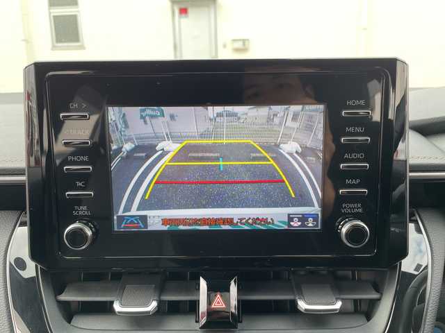 トヨタ カローラツーリング ハイブリッド ダブルバイビー 三重県 2020(令2)年 4.3万km ホワイトパールクリスタルシャイン 登録時42719km/純正７インチＴ－ｃｏｎｎｅｃｔナビ/・Bluetooth・Miracast・AM/FM・USB/トヨタセーフティセンスシステム/・プリクラッシュセーフティシステム/・レーントレーシングアシスト/・ロードサインアシスト/・AUTOライト/・オートマチックハイビーム/・前後コーナーセンサー/・レーダークルーズコントロール/バックカメラ/ＡＣ１００Ｖ電源/ＳＯＳスイッチ/ハーフレザーシート/ビルドインETC/電動パーキングブレーキ/ブレーキホールド/純正フロアマット/ドアバイザー/LEDヘッドライト