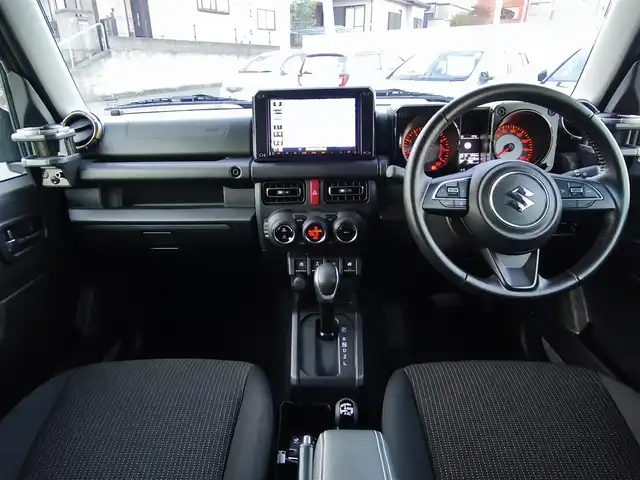 スズキ ジムニー シエラ JC 熊本県 2021(令3)年 1.5万km ミディアムグレー ワンオーナー/1インチリフトアップ車/ルーフキャリア/サイドステップバー/リアラダー/サイドラック（ロトパックス）/社外8インチナビ（CN-RZ865）/【フルセグTV/Bluetooth再生/CD/DVD】/車線逸脱警報システム/デュアルセンサーブレーキサポート/シートヒーター/LEDオートライト/フォグライト/ビルトインETC/純正15インチAW/純正フロアマット/ドアバイザー/保証書/取扱説明書