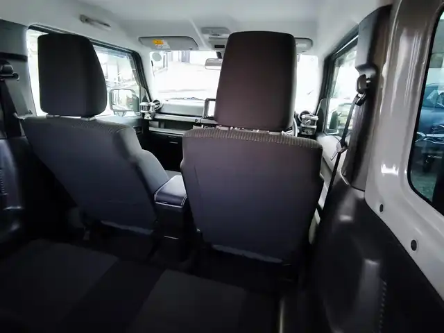 スズキ ジムニー シエラ JC 熊本県 2021(令3)年 1.5万km ミディアムグレー ワンオーナー/1インチリフトアップ車/ルーフキャリア/サイドステップバー/リアラダー/サイドラック（ロトパックス）/社外8インチナビ（CN-RZ865）/【フルセグTV/Bluetooth再生/CD/DVD】/車線逸脱警報システム/デュアルセンサーブレーキサポート/シートヒーター/LEDオートライト/フォグライト/ビルトインETC/純正15インチAW/純正フロアマット/ドアバイザー/保証書/取扱説明書