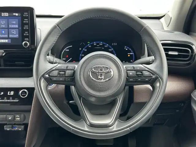 トヨタ ヤリスクロス ハイブリッド Z 山形県 2021(令3)年 2.4万km ホワイトパールクリスタルシャイン 禁煙車/純正ディスプレイオーディオ/（BT/FM/AM/USB)/トヨタセーフティーセンス/レーンキープアシスト/ハーフレザーシート/前席シートヒーター/運転席パワーシート/純正アルミホイール/追従クルーズコントロール/前後ドライブレコーダー/ETC/バックカメラ/LEDオートライト/スマートキー/スペアキー×1
