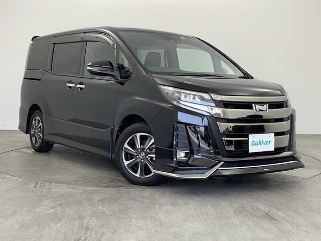 トヨタ ノア Si ダブルバイビー 兵庫県 2018(平30)年 4.7万km ブラック ・社外ナビ/TV/CD/DVD/SD/Bluetooth/・純正ビルトインETC/・バックカメラ/・モデリスタフロントエアロパーツ/・両側パワースライドドア/・ハーフレザーシート/・純正アルミホイール/・純正フロアマット/・革巻きステアリング/・クルーズコントロール/・トヨタセーフティセンス/・プリクラッシュセーフティ/・レーンキープアシスト/・盗難防止装置/・オートライト/・オートマチックハイビーム/・LEDヘッドライト/・LEDフォグランプ/・リアロールシェイド/・シートバックテーブル/・ステアリングリモコン/・スマートキー/・プッシュスタート