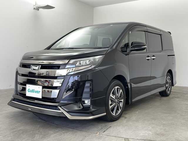 トヨタ ノア Si ダブルバイビー 兵庫県 2018(平30)年 4.7万km ブラック ・社外ナビ/TV/CD/DVD/SD/Bluetooth/・純正ビルトインETC/・バックカメラ/・モデリスタフロントエアロパーツ/・両側パワースライドドア/・ハーフレザーシート/・純正アルミホイール/・純正フロアマット/・革巻きステアリング/・クルーズコントロール/・トヨタセーフティセンス/・プリクラッシュセーフティ/・レーンキープアシスト/・盗難防止装置/・オートライト/・オートマチックハイビーム/・LEDヘッドライト/・LEDフォグランプ/・リアロールシェイド/・シートバックテーブル/・ステアリングリモコン/・スマートキー/・プッシュスタート