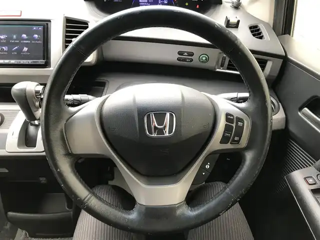 ホンダ フリード ハイブリット ジャストセレクション 栃木県 2012(平24)年 8.8万km プレミアムブラキッシュパール 株)IDOMが運営する【じしゃロン小山店】の自社ローン専用車両になります。こちらは現金またはオートローンご利用時の価格です。自社ローンご希望の方は別途その旨お申付け下さい//禁煙車/社外フルセグナビ/（CD/DVD/AM/FMラジオ）/(Bluetooth)/スマートキー/バックカメラ/クルーズコントロール/ＥＴＣ/両側パワースライドドア/ステアリングリモコン/電動格納ドアミラー/パワーウインドウ/防眩ミラー/オートライト