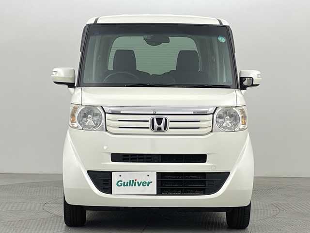 ホンダ Ｎ ＢＯＸ G ターボパッケージ 新潟県 2013(平25)年 9.3万km プレミアムホワイトパール 4WD/社外メモリナビ/フルセグ/　CD/DVD/SD/バックカメラ/両側パワースライドドア/スマートキー×２/キセノンヘッドライト/クルーズコントロール/プッシュスタート/ドライブレコーダー/ETC/SW付きスタッドレス積み込み/　（６mm）