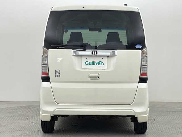 ホンダ Ｎ ＢＯＸ G ターボパッケージ 新潟県 2013(平25)年 9.3万km プレミアムホワイトパール 4WD/社外メモリナビ/フルセグ/　CD/DVD/SD/バックカメラ/両側パワースライドドア/スマートキー×２/キセノンヘッドライト/クルーズコントロール/プッシュスタート/ドライブレコーダー/ETC/SW付きスタッドレス積み込み/　（６mm）