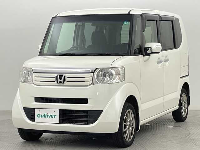 ホンダ Ｎ ＢＯＸ G ターボパッケージ 新潟県 2013(平25)年 9.3万km プレミアムホワイトパール 4WD/社外メモリナビ/フルセグ/　CD/DVD/SD/バックカメラ/両側パワースライドドア/スマートキー×２/キセノンヘッドライト/クルーズコントロール/プッシュスタート/ドライブレコーダー/ETC/SW付きスタッドレス積み込み/　（６mm）
