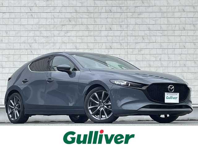 マツダ マツダ３ファストバック 15S ツーリング 岩手県 2019(令1)年 6.6万km ポリメタルグレーM 禁煙車/6MT/全方位カメラ/追従型クルーズコントロール/ブラインドスポットモニター/純正ナビ/→フルセグTV/Bluetooth/CD/DVD/FM/AM/バックカメラ/ステアリングスイッチ/横滑り防止装置/衝突軽減システム/コーナーセンサー/オートライト/オートマチックハイビーム/ポジション球LED/〇プッシュスタート/〇電動格納ミラー/〇ウィンカーミラー/〇フロアマット/〇HDMI/〇USBポート/〇シガーソケット/オールオートハイビーム/ビルトインETC/スペアキー