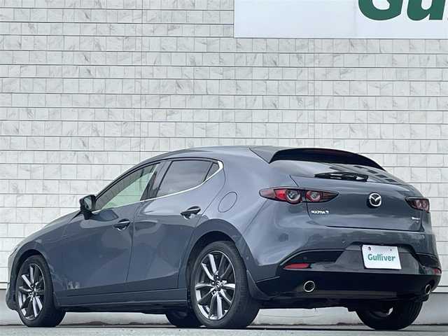 マツダ マツダ３ファストバック 15S ツーリング 岩手県 2019(令1)年 6.6万km ポリメタルグレーM 禁煙車/6MT/全方位カメラ/追従型クルーズコントロール/ブラインドスポットモニター/純正ナビ/→フルセグTV/Bluetooth/CD/DVD/FM/AM/バックカメラ/ステアリングスイッチ/横滑り防止装置/衝突軽減システム/コーナーセンサー/オートライト/オートマチックハイビーム/ポジション球LED/〇プッシュスタート/〇電動格納ミラー/〇ウィンカーミラー/〇フロアマット/〇HDMI/〇USBポート/〇シガーソケット/オールオートハイビーム/ビルトインETC/スペアキー
