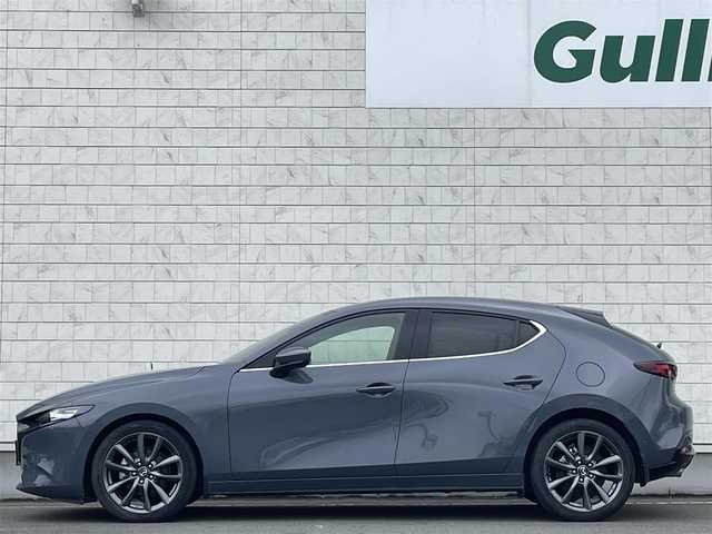 マツダ マツダ３ファストバック 15S ツーリング 岩手県 2019(令1)年 6.6万km ポリメタルグレーM 禁煙車/6MT/全方位カメラ/追従型クルーズコントロール/ブラインドスポットモニター/純正ナビ/→フルセグTV/Bluetooth/CD/DVD/FM/AM/バックカメラ/ステアリングスイッチ/横滑り防止装置/衝突軽減システム/コーナーセンサー/オートライト/オートマチックハイビーム/ポジション球LED/〇プッシュスタート/〇電動格納ミラー/〇ウィンカーミラー/〇フロアマット/〇HDMI/〇USBポート/〇シガーソケット/オールオートハイビーム/ビルトインETC/スペアキー