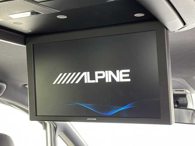 トヨタ ヴォクシー ZS 煌Ⅱ 広島県 2020(令2)年 5.7万km ホワイトパールクリスタルシャイン 禁煙車/ＡＬＰＩＮＥ9型ナビ/ＡＬＰＩＮＥ12.8型フリップダウンモニター/バックカメラ/両側パワースライドドア/クルーズコントロール/前後ドラレコ/ＥＴＣ/オートマチックハイビーム/衝突軽減/レーンキープアシスト/コーナーセンサー/LEDヘッドライト/エアバッグ(運転席/助手席/サイド/カーテン)/純正16インチアルミホイール(205/60/R16)