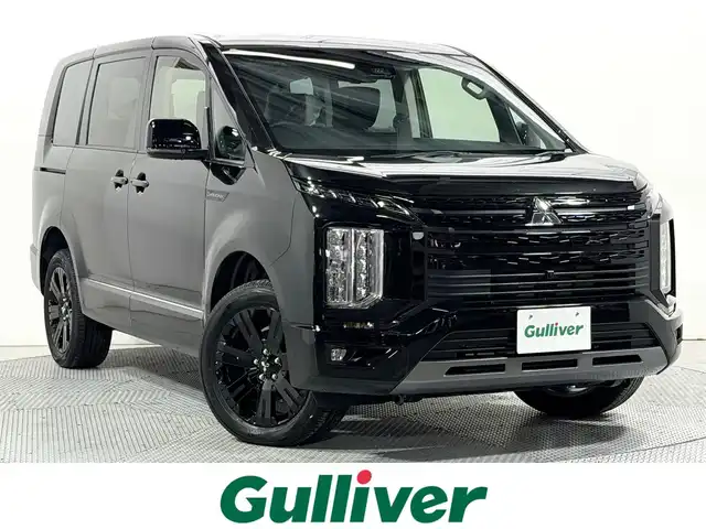 三菱 デリカＤ：５ シャモニー 大阪府 2025(令7)年 0.1千km 黒Ⅱ 登録済未使用車 ALPINE12.8incナビTV 360カメラ フリップダウンモニター パワーシート/ヒーター ステアリングヒーター 電動リアゲート レーダークルコン 衝突軽減ブレーキ レーンアシスト ブラインドSM 100V電源