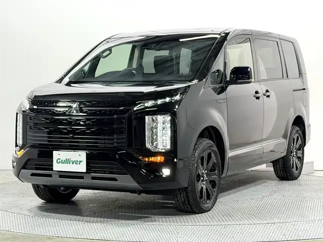三菱 デリカＤ：５ シャモニー 大阪府 2025(令7)年 0.1千km 黒Ⅱ 登録済未使用車 ALPINE12.8incナビTV 360カメラ フリップダウンモニター パワーシート/ヒーター ステアリングヒーター 電動リアゲート レーダークルコン 衝突軽減ブレーキ レーンアシスト ブラインドSM 100V電源