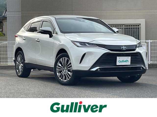 トヨタ ハリアー ハイブリッド Z 山口県 2022(令4)年 3.4万km ホワイトパールクリスタルシャイン JBL 12.3型ナビ フルセグTV BT USB AUX/全周囲カメラ/デジタルインナーミラー/ハーフレザーシート/パワーシート/パワーバックドア/ビルトイン 2.0ETC/19インチ アルミホイール/衝突被害軽減ブレーキ/レーダークルーズコントロール/レーンアシスト/オートマチックハイビーム/LEDオートヘッドライト/フォグライト/コーナーセンサー/スマートキー 2個/ステアリングリモコン/置くだけ充電/W サイド カーテン ニー エアバッグ/保証書 取説/禁煙車