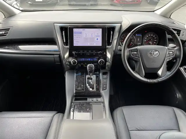 トヨタ ヴェルファイア Z Gエディション 愛媛県 2020(令2)年 1.4万km ホワイトパールクリスタルシャイン ワンオーナー/純正ディスプレイオーディオナビ/12.1インチ純正フリップダウンモニター/・Bluetooth/・CD/DVD/・USB入力端子/フルセグTV（走行時視聴可能）/バックカメラ/ビルドインETC/ドライブレコーダー/両側パワースライドドア/パワーバックドア/レザーシート/パワーシート/快適温熱シート/ステアリングヒーター/プリクラッシュセーフティシステム（ＰＣＳ）/レーントレーシングアシスト（ＬＴＡ）/レーダークルーズコントロール/オートマチックハイビーム（ＡＨＢ）/コーナーセンサー/純正フロアマット/純正18インチAW/LEDヘッドライト/カーテンエアバッグ/スペアキー/スマートキー/取扱説明書