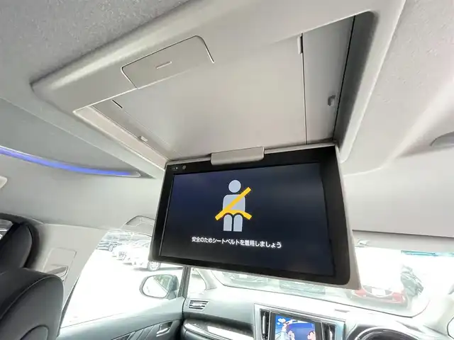 トヨタ ヴェルファイア Z Gエディション 愛媛県 2020(令2)年 1.4万km ホワイトパールクリスタルシャイン ワンオーナー/純正ディスプレイオーディオナビ/12.1インチ純正フリップダウンモニター/・Bluetooth/・CD/DVD/・USB入力端子/フルセグTV（走行時視聴可能）/バックカメラ/ビルドインETC/ドライブレコーダー/両側パワースライドドア/パワーバックドア/レザーシート/パワーシート/快適温熱シート/ステアリングヒーター/プリクラッシュセーフティシステム（ＰＣＳ）/レーントレーシングアシスト（ＬＴＡ）/レーダークルーズコントロール/オートマチックハイビーム（ＡＨＢ）/コーナーセンサー/純正フロアマット/純正18インチAW/LEDヘッドライト/カーテンエアバッグ/スペアキー/スマートキー/取扱説明書