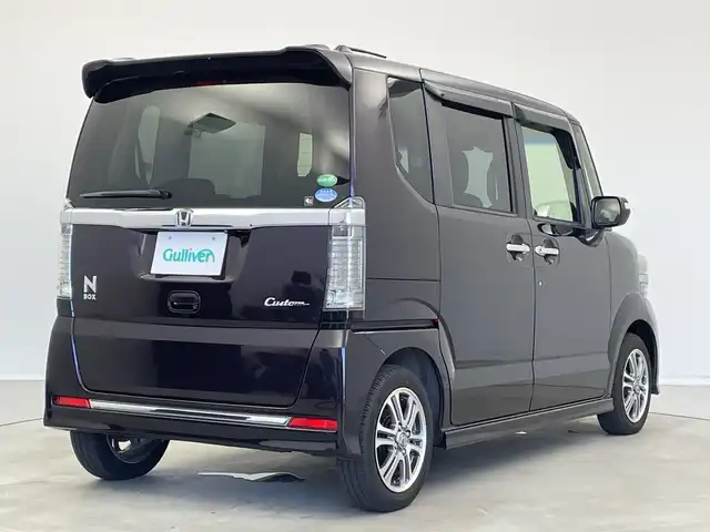 ホンダ Ｎ ＢＯＸ カスタム SSパッケージ 新潟県 2015(平27)年 4.3万km プレミアムベルベットパープル・パール 社外メモリナビ（型式：AVN-G05）/・AM/FM/CD/DVD/Bluetooth/USB/フルセグ/バックモニター/両側パワースライドドア/ベンチシート/キセノンヘッドライト/オートライト/純正フロアマット/純正14インチAW夏タイヤ/ABS/横滑り防止機能/保証書