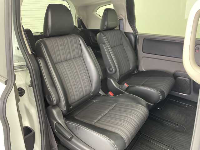 ホンダ フリード ハイブリット G ホンダセンシング 愛知県 2017(平29)年 6万km ホワイトオーキッドパール 社外ナビ/・Bluetooth/・CD/DVD/・フルセグテレビ/バックカメラ/レーダークルーズコントロール/衝突軽減ブレーキ/レーンキープアシスト/ハーフレザーシート/ルーフキャリア/RAZOシフトノブ/両側パワースライドドア/ビルトインETC