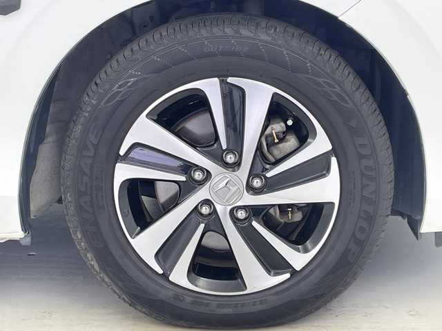 ホンダ フリード ハイブリット G ホンダセンシング 愛知県 2017(平29)年 6万km ホワイトオーキッドパール 社外ナビ/・Bluetooth/・CD/DVD/・フルセグテレビ/バックカメラ/レーダークルーズコントロール/衝突軽減ブレーキ/レーンキープアシスト/ハーフレザーシート/ルーフキャリア/RAZOシフトノブ/両側パワースライドドア/ビルトインETC