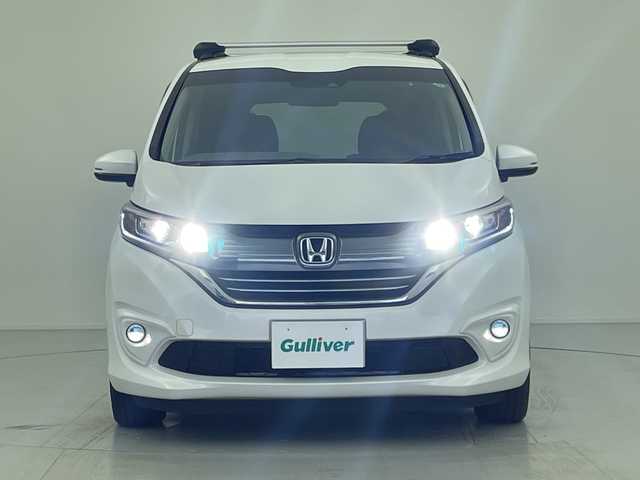 ホンダ フリード ハイブリット G ホンダセンシング 愛知県 2017(平29)年 6万km ホワイトオーキッドパール 社外ナビ/・Bluetooth/・CD/DVD/・フルセグテレビ/バックカメラ/レーダークルーズコントロール/衝突軽減ブレーキ/レーンキープアシスト/ハーフレザーシート/ルーフキャリア/RAZOシフトノブ/両側パワースライドドア/ビルトインETC