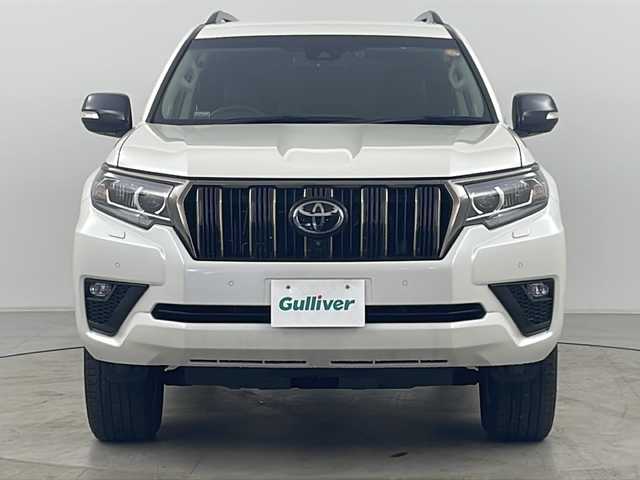 トヨタ ランドクルーザー プラド TX Lパッケージ ブラックED 道央・札幌 2021(令3)年 1.5万km ホワイトパールクリスタルシャイン ・4WD/・寒冷地仕様/・ルーフレール/・リアスポイラー/・サイドステップ/・純正ディスプレイオーディオ/（TV/BT/AppleCarPlay/AndroidAuto）/・全方位カメラ/・バックカメラ/・アダプティブクルーズコントロール/・革シート/・前席パワーシート＆シートヒーター＆ベンチレーション/・ドアミラーヒーター/・フロントワイパーデアイザー/・ビルトインETC2.0/・オートライト/・オートマチックハイビーム/・TSS/・横滑り防止装置/・LDA