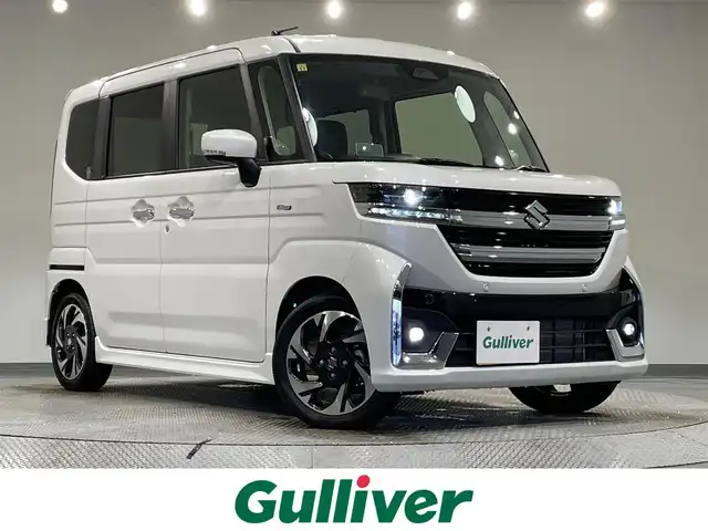 スズキ スペーシア カスタム HYBRID XS 愛知県 2023(令5)年 1.4万km ピュアホワイトP ８incナビ/CD/DVD/BT/フルセグTV/衝突軽減ブレーキ/クルーズコントロール/車線逸脱警報/先行車発進お知らせ機能/踏み間違い防止/両側パワースライドドア/ヘッドアップディスプレイ/シートヒーター/ステアリングヒーター/サーキュレーター/オートブレーキホールド/電子サイドブレーキ/スマートキー/プッシュスタート/LEDヘッドライト/オートライト/ハイビームアシスト