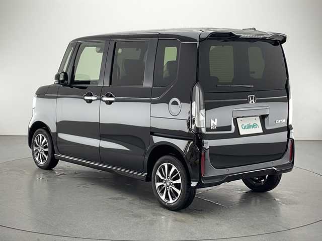 ホンダ Ｎ ＢＯＸ カスタム 長野県 2025(令7)年 0.1千km クリスタルブラックパール 4WD/届出済未使用車/ホンダセンシング/・路外逸脱抑制機能/・踏み間違い衝突軽減システム/・パーキングセンサーシステム/・衝突軽減ブレーキ/・先行車発進お知らせ機能/・歩行者事故低減ステアリング/・標識認識機能/・踏み間違い衝突軽減システム/・急アクセル抑制機能/プッシュスタートボタン/アイドリングストップ/スマートキー/レーダークルーズコントロール/Type-C充電/D+N席シートヒーター/左側電動スライドドア/純正14インチアルミ/ABS/横滑り防止装置/オートライト/オートハイビーム/LEDヘッドライト/W+カーテンエアバッグ/保証書/取扱説明書/スペアキー×1