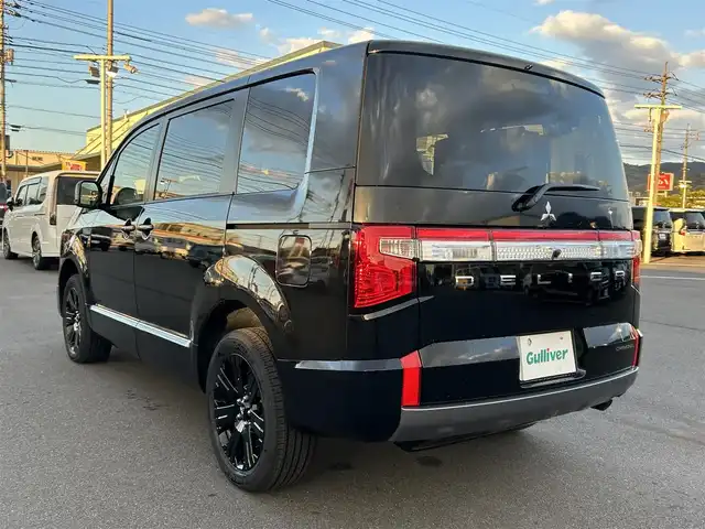 三菱 デリカＤ：５ シャモニー 岡山県 2025(令7)年 0.1千km ブラックダイヤモンド 登録済未使用車/登録時走行距離7km/ワンオーナー/禁煙車/ディーゼルターボ/ALPINE11インチナビ/　(CD/DVD/フルセグTV/Bluetooth)/バックカメラ/クルーズコントロール(追従走行あり)/衝突被害軽減システム/車線逸脱警報（レーンキープアシスト）/両側パワースライドドア/ハーフレザーシート/シートヒーター/パワーバックドア/ステアリングヒーター/革巻きステアリング/ステアリングスイッチ/純正LEDヘッドライト/フォグライト/オートライト/プッシュスタート/スマートキー/スペアキー×1/パドルシフト/アイドリングストップ/純正アルミホイール 18インチ/電動格納ミラー/横滑防止装置/盗難防止装置/取扱説明書/新車時整備手帳（保証書）