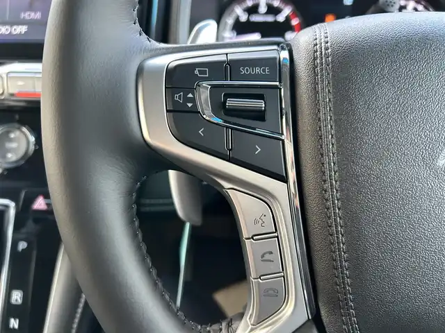 三菱 デリカＤ：５ シャモニー 岡山県 2025(令7)年 0.1千km ブラックダイヤモンド 登録済未使用車/登録時走行距離7km/ワンオーナー/禁煙車/ディーゼルターボ/ALPINE11インチナビ/　(CD/DVD/フルセグTV/Bluetooth)/バックカメラ/クルーズコントロール(追従走行あり)/衝突被害軽減システム/車線逸脱警報（レーンキープアシスト）/両側パワースライドドア/ハーフレザーシート/シートヒーター/パワーバックドア/ステアリングヒーター/革巻きステアリング/ステアリングスイッチ/純正LEDヘッドライト/フォグライト/オートライト/プッシュスタート/スマートキー/スペアキー×1/パドルシフト/アイドリングストップ/純正アルミホイール 18インチ/電動格納ミラー/横滑防止装置/盗難防止装置/取扱説明書/新車時整備手帳（保証書）