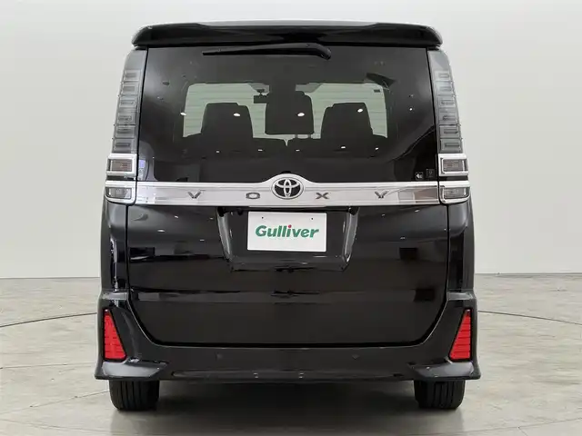 トヨタ ヴォクシー ZS 煌Ⅲ 福岡県 2021(令3)年 3.9万km ブラック 後席モニター　/純正１０型ナビ／フルセグＴＶ　/バックカメラ　/ビルトインETC　/前後ドラレコ　/クルーズコントロール　/コーナーセンサー　/衝突軽減ブレーキ　/レーンキープ　/アクセル踏み間違い防止　/両側電動スライドドア　/ハーフレザーシート