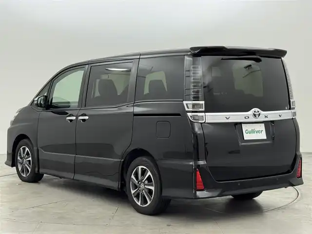 トヨタ ヴォクシー ZS 煌Ⅲ 福岡県 2021(令3)年 3.9万km ブラック 後席モニター　/純正１０型ナビ／フルセグＴＶ　/バックカメラ　/ビルトインETC　/前後ドラレコ　/クルーズコントロール　/コーナーセンサー　/衝突軽減ブレーキ　/レーンキープ　/アクセル踏み間違い防止　/両側電動スライドドア　/ハーフレザーシート