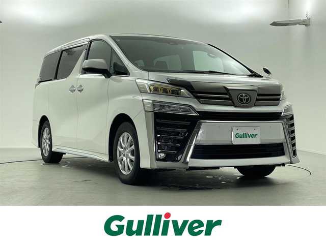 トヨタ ヴェルファイア ゴールデンアイズⅡ 愛媛県 2021(令3)年 4.2万km ホワイトパールクリスタルシャイン サンルーフ/純正フリップダウンモニター/純正ナビ/・Bluetooth/・HDMI入力端子/・USB入力端子/フルセグTV/バックカメラ/ビルトインETC/ドライブレコーダー/両側パワースライドドア/コーナーセンサー/電動リアゲート/衝突軽減システム/クルーズコントロール（追従有）/レーンキープアシスト/オートライト/オートマチックハイビーム/RSA/nanoeエアコン/LEDヘッドライド/プッシュスタート/スマートキー/スペアキー/取扱説明書/保証書