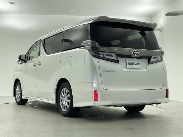 トヨタ ヴェルファイア ゴールデンアイズⅡ 愛媛県 2021(令3)年 4.2万km ホワイトパールクリスタルシャイン サンルーフ/純正フリップダウンモニター/純正ナビ/・Bluetooth/・HDMI入力端子/・USB入力端子/フルセグTV/バックカメラ/ビルトインETC/ドライブレコーダー/両側パワースライドドア/コーナーセンサー/電動リアゲート/衝突軽減システム/クルーズコントロール（追従有）/レーンキープアシスト/オートライト/オートマチックハイビーム/RSA/nanoeエアコン/LEDヘッドライド/プッシュスタート/スマートキー/スペアキー/取扱説明書/保証書