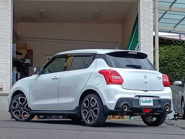スズキ スイフト スポーツ 大分県 2023(令5)年 4.3万km ピュアホワイトP 純正メモリーナビ/フルセグ/Bluetooth/DVD/アラウンドビューモニター/クルーズコントロール/レーンキープアシスト/ビルトインETC/シートヒーター/純正LEDヘッドライト/フォグランプ/オートライトコントロール/純正16インチアルミホイール