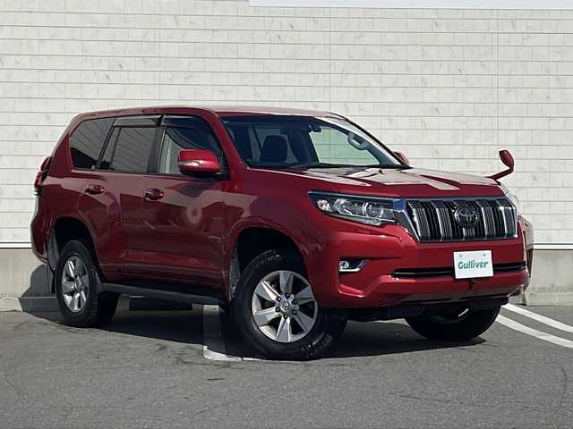 トヨタ ランドクルーザー プラド TX 山形県 2018(平30)年 3.1万km レッドマイカメタリック ワンオーナー/Toyota Safety Sense		/・プリクラッシュセーフティ		/・レーンディパーチャーアラート（LDA）		/・レーダークルーズコントロール							/・オートマチックハイビーム	/・横滑り抑制機能		/純正ナビ（CD/DVD/Bluetooth）/フルセグテレビ/バックカメラ/ビルトインETC/純正ドライブレコーダー/コーナーセンサー/ヘッドランプクリーナー/プッシュスタート/スマートキー/フォグランプ/LEDヘッドライト/ドアバイザー